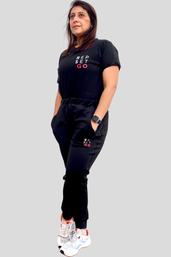 woman wearing repset-go black jogger pants